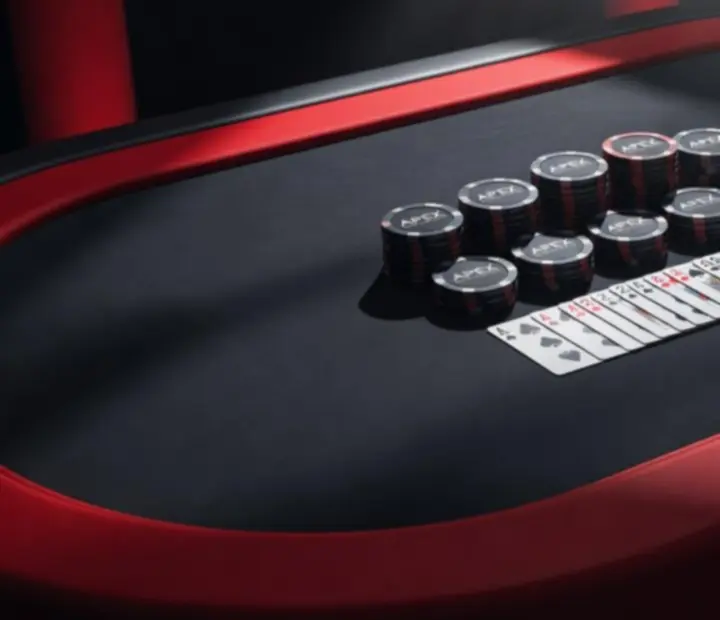 Strefa Blackjack z eleganckim czarno-czerwonym stołem i żetonami eventowymi
